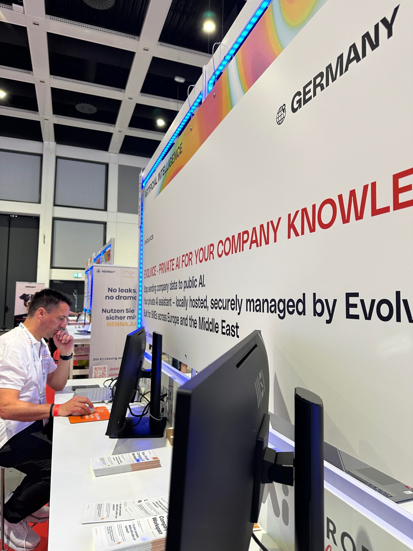 Evolvice booth backdrop — Private AI for your company knowledge