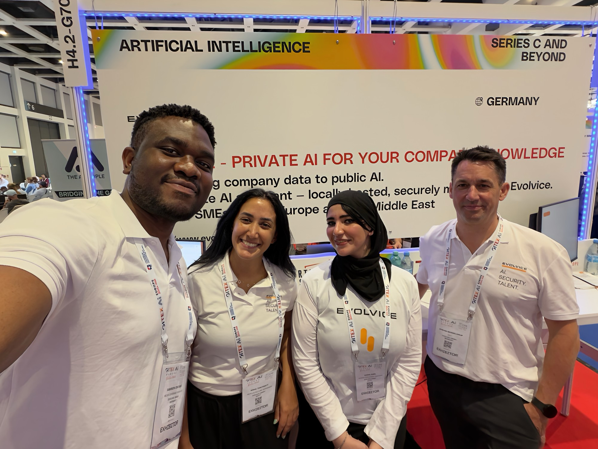Evolvice team selfie at the GITEX Europe Berlin 2026 booth